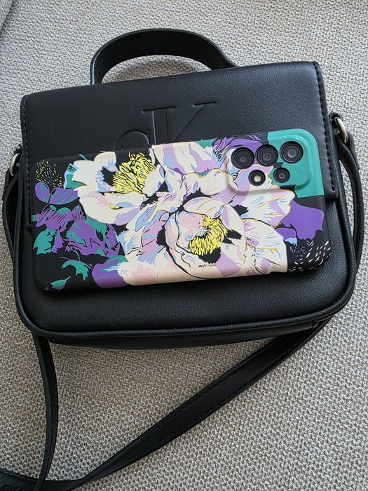 Geanta mica CK cu mici urme de uzura