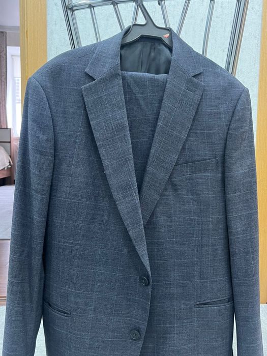 Продам мужские костюм