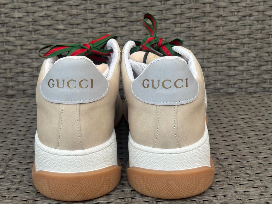 vand adidasi gucci