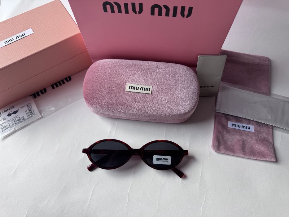 Ochelari de soare Miu Miu Oval SMU04Z 50-18 140, Noi