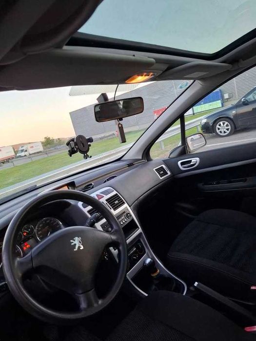 Peugeot 307 sw ,an 2007, 7 locuri ,benzina /motor 1.6/ 109 cp. 186.000 km/doua rinduri de jante ,aliaj si tabla