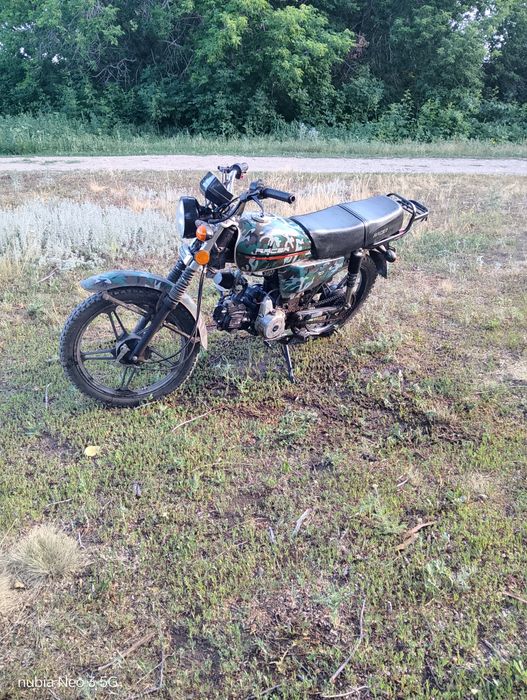 Рейсер Trophy 110