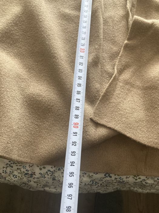 Жилетка, не е носена.