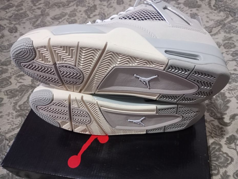Jordan 4 Frozen Moments