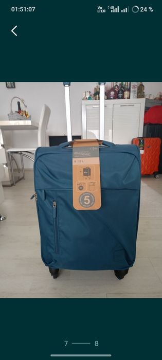 Vând troler material textil,dimensiune de 55 cm,nou, produs calitate.