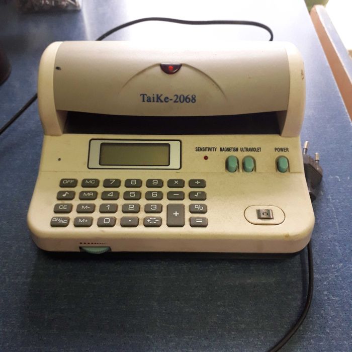 Аппарат для проверки денежных купюр