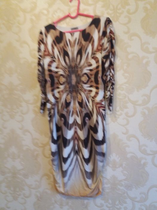 Женская одежда..