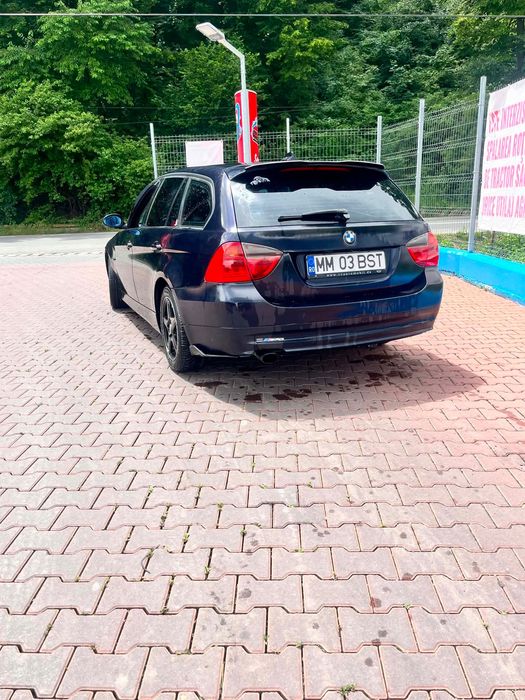 BMW e 90 2.0 benzină 2007 acte valabile geamuri electrice navigație automat dublu clik în pedală