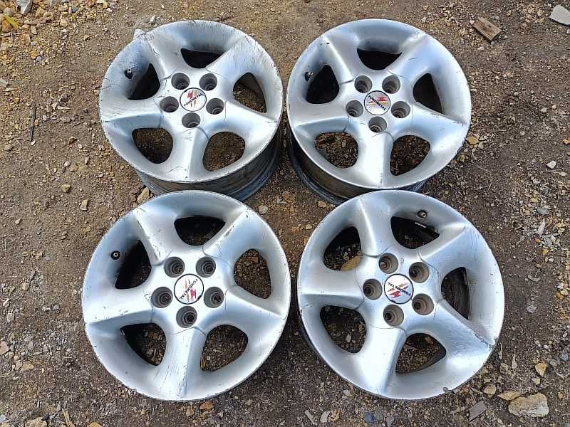 Продам оригинальные легкосплавные диски "Fondmetal" R15 на Ауди 100