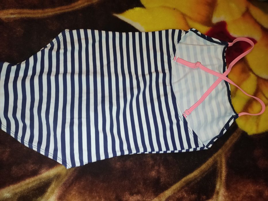 Продам два классных купальника на девочку