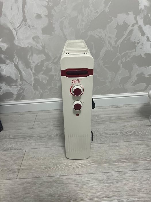 Масляный обогреватель.