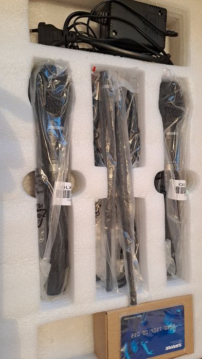 Продам новый микрофон SHURE QLXD4