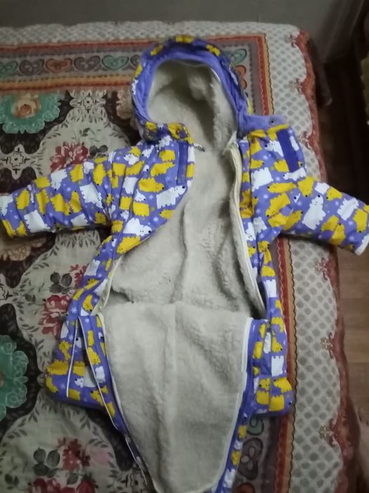 Продам комбинезон и коляску