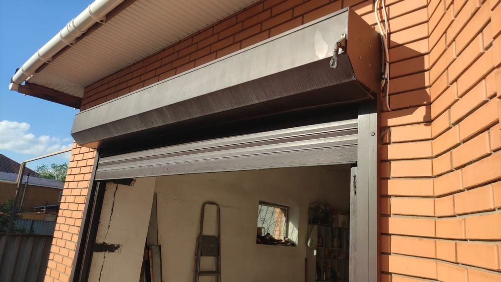 Ремонт секционных ворот,шлагбаумов.