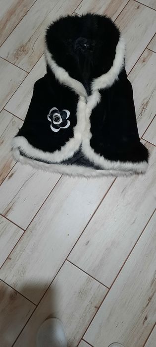 Vand vesta blana dama