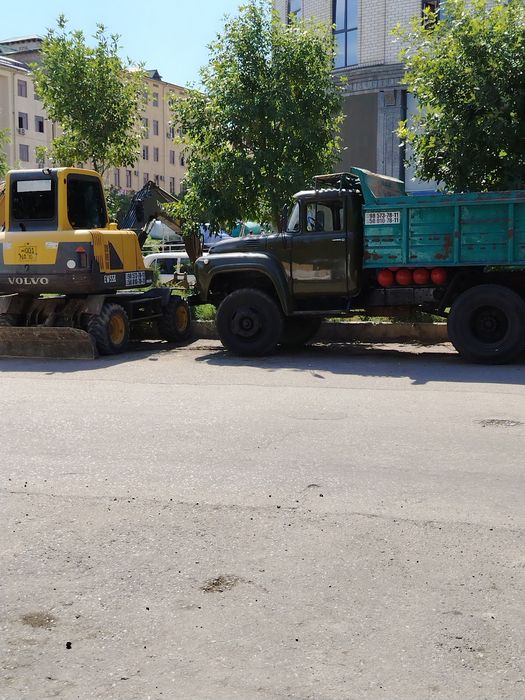 Экскаватор ва зил хизматлари