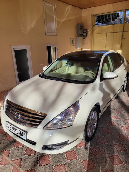 Ниссан тяна 2009