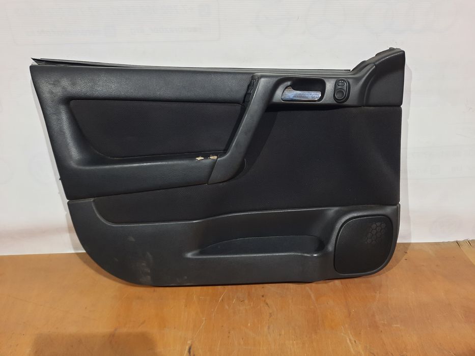 Обшивки дверей Опель Астра G