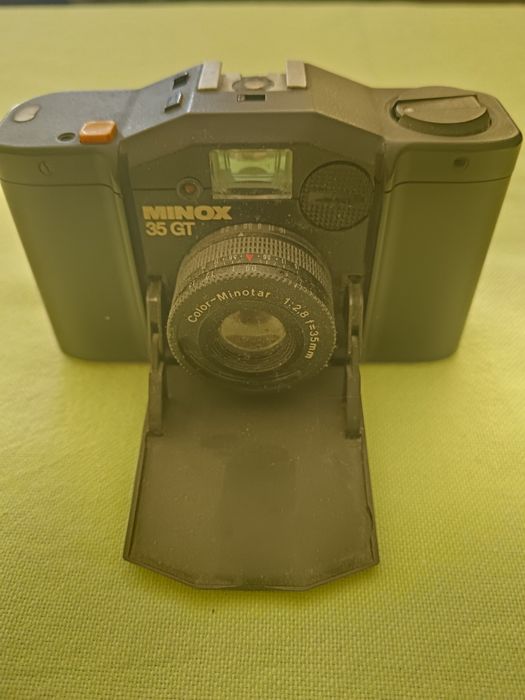 Фотоапарати, светкавици, гривни за преснимане и др.