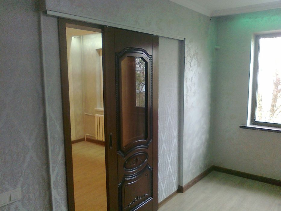 Поклейка обоев.Отделка.Электрика.