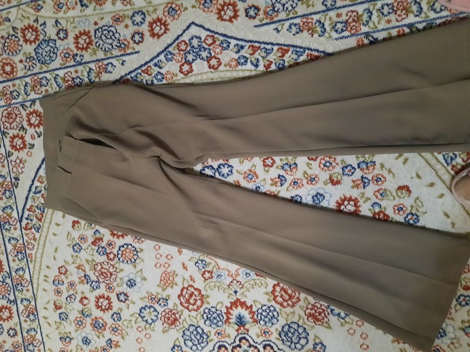 Джинсы и брюки коричневый