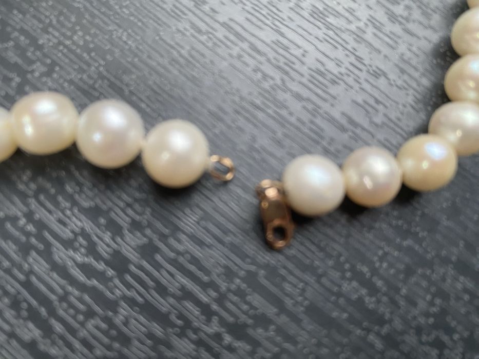 Асл аеллар тақинчоғи марварид