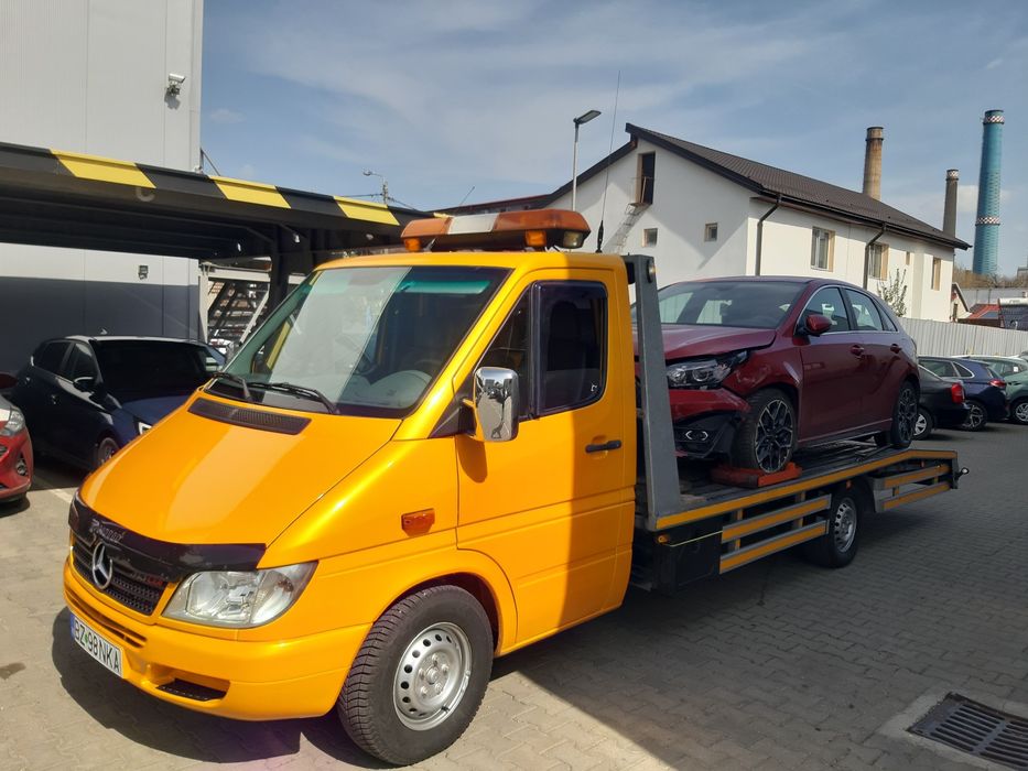 Tractari auto platforma auto asistenta rutiera ramnicu sarat  A7 24/24