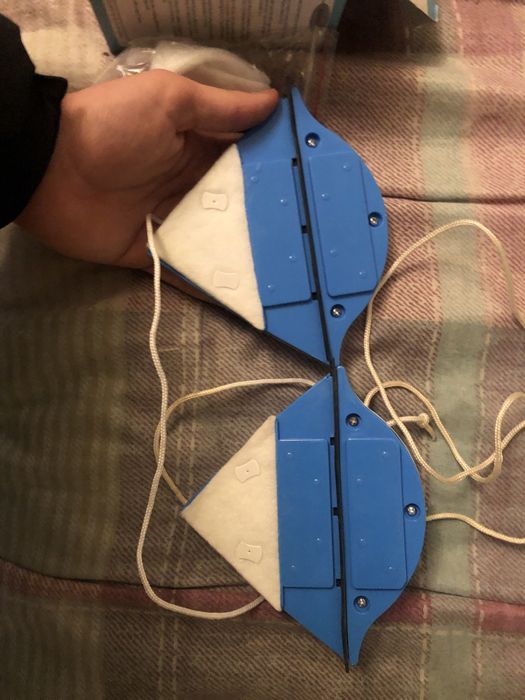 Уред за почистване на прозорци и от двете страни