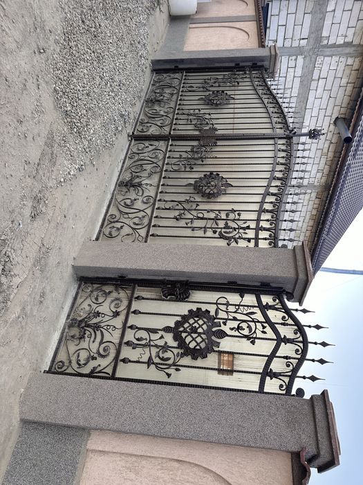 Porti fier forjat gard