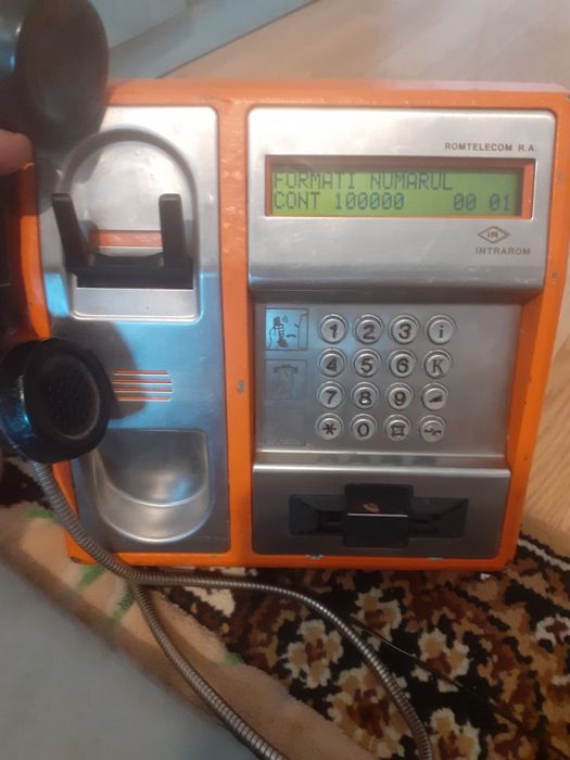 Telefon public functional cu cartela noua de 100 000 unitati stare estetica nota 8,5 din 10