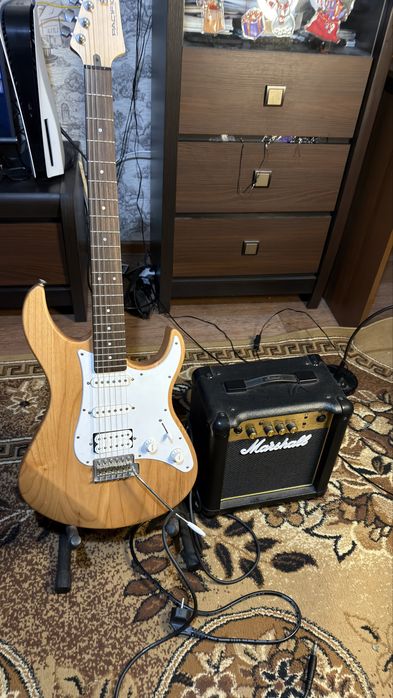 Электрогитара + комбо усилитель.