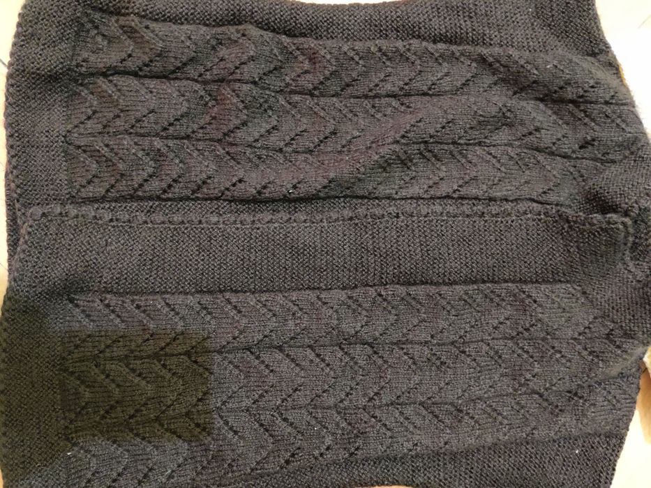 Вълнени елеци и други на една кука и два шиша