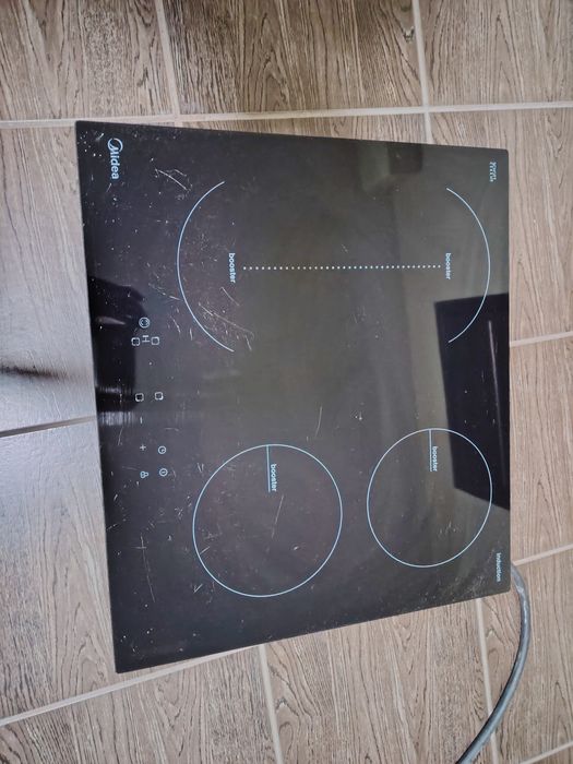 Индукционная плита Midea