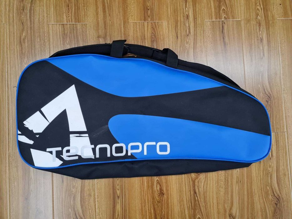 Set: Racheta Fisher, Geanta Tecnopro, 2 seturi mingi Wilson, grip Head