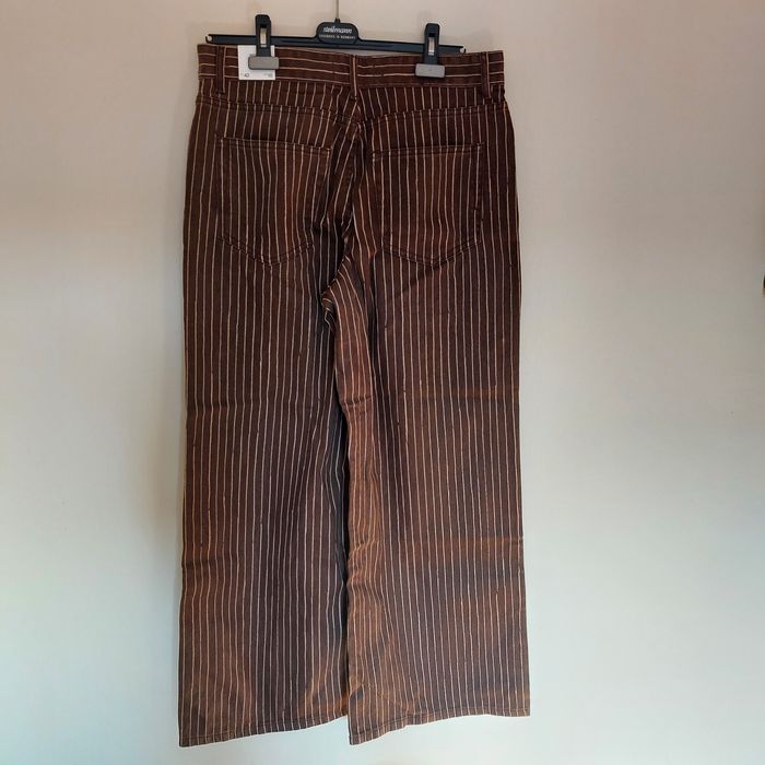 Pantaloni largi Mango cu dungi