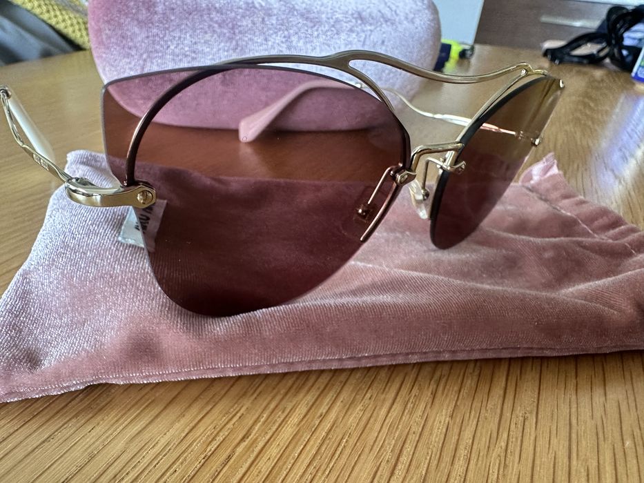 Слънчеви очилаMiu Miu