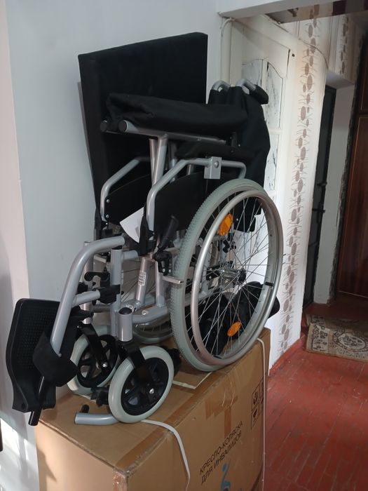 Инвалидная коляска