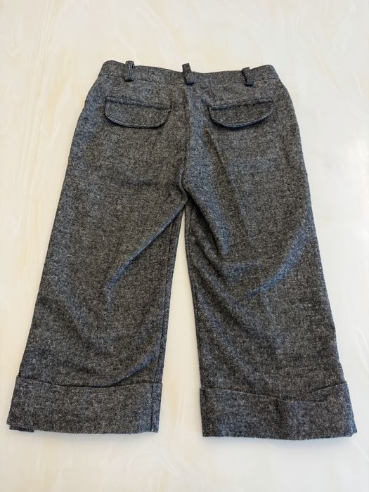 Pantaloni trei sferturi