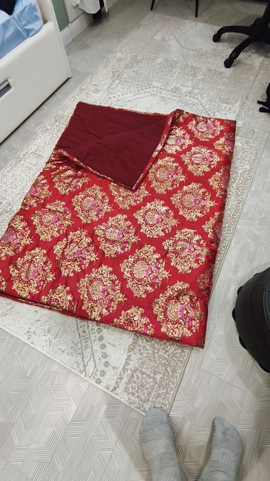 Көрпе жамылатын.