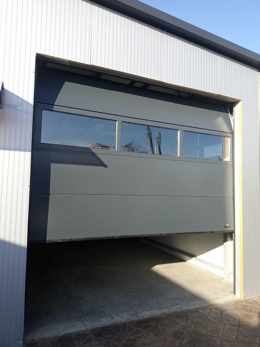 Врати гаражни, ролетни и охранителни, сенници доставка и монтаж