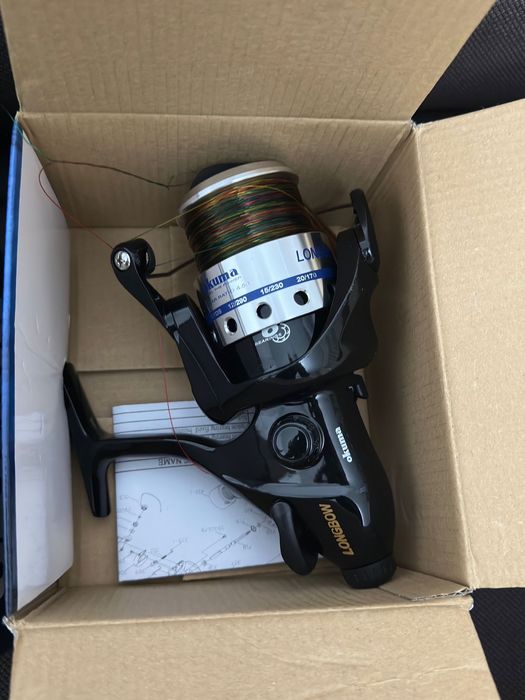 Okuma custom black + longbow