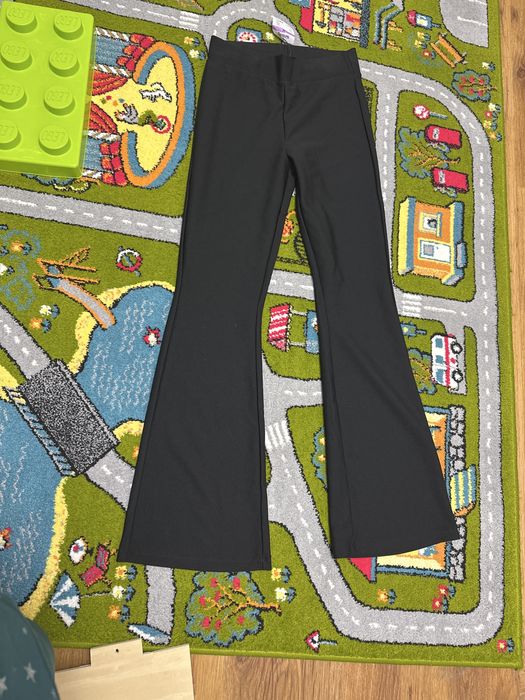 Pantaloni evazati Sinsay