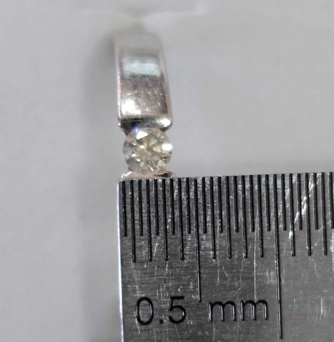 Пръстен от бяло злато проба 585 / с диамант