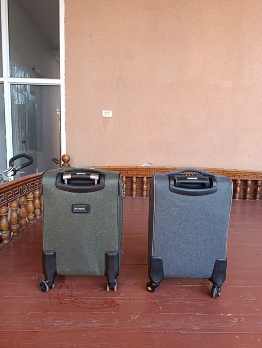 Чемадан четырёх колёсный