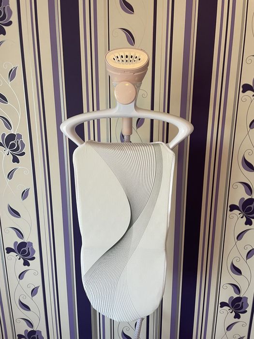 Aparat de calcat vertical cu abur