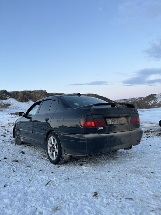 Ниссан примера п11