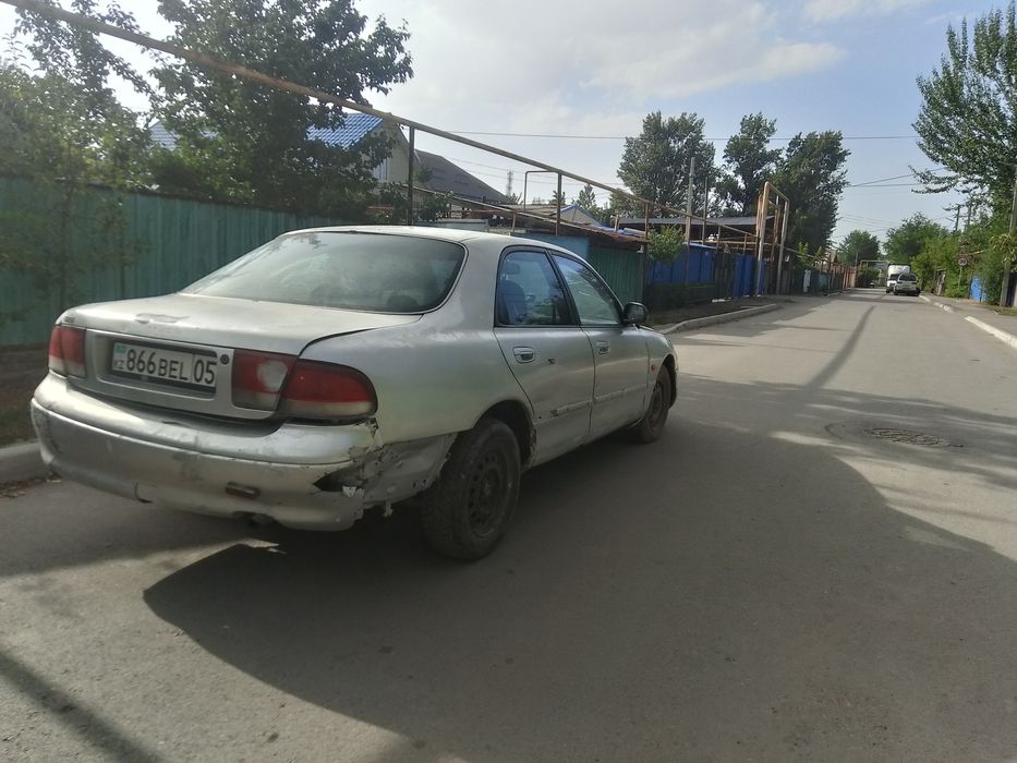 Мазда кронос       .