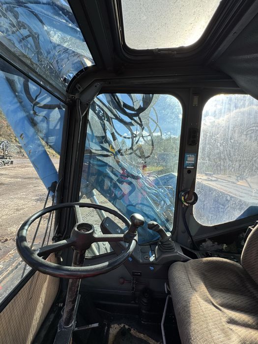 Колесен багер Atlas