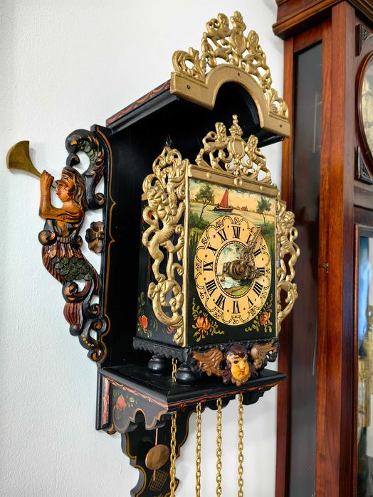 ceas de perete FRANZ HERMLE,cu greutati,cu sirene sculptate