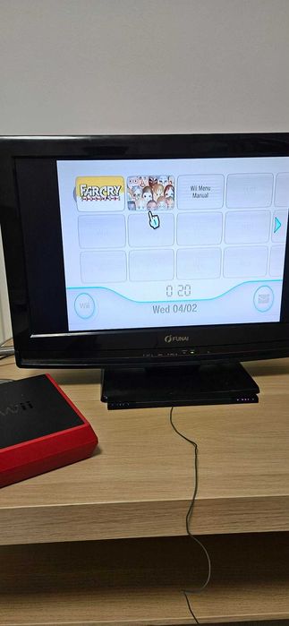 Consola nintendo wii+ 5 jocuri si manusi de box
